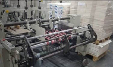 Corrugated box processing machine